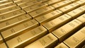 Gold bars stacked in the warehouse. Financial concepts. many gold bars. Macro view of stacks of gold, 3D rendering Royalty Free Stock Photo