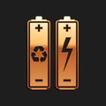 Gold Battery with recycle symbol - renewable energy concept icon isolated on black background. Long shadow style. Vector Royalty Free Stock Photo