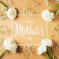 Gold, beige or yellow mothers day card flowers and gift flat lay with greeting text