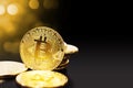 Gold bitcoin on black background Royalty Free Stock Photo