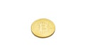 Gold bitcoin coin, front side, isolated on white background with reflection