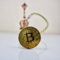 Gold bitcoin coin and small sisha Royalty Free Stock Photo