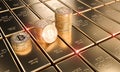 Gold bitcoin coins on classic ingots, concept of cryptocurrency and economy