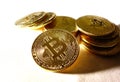 Gold bitcoin cryptocurrency coins on white background Royalty Free Stock Photo