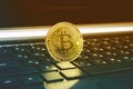 ..Gold bitcoin cryptocurrency with a latop computer Royalty Free Stock Photo