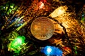 Gold bitcoin decoration on christmas tree