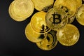 Gold Bitcoin and other Crypto Currency Coins Lying On a Black Background Royalty Free Stock Photo