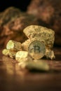 Gold bitcoin physical and Gold nugget grains. Concept mining cry