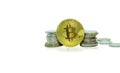 Gold Bitcoin stack on isolated white background.