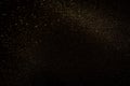 Gold and black glitter vintage lights background. defocused Royalty Free Stock Photo