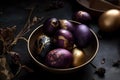 Gold, black and purple decorated Easter eggs painted by hand on a dark background, Royalty Free Stock Photo