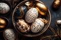 Gold, black and white decorated Easter eggs painted by hand on a dark background Royalty Free Stock Photo