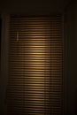 Gold blinds on the window. Closed blinds. Room Interior Details Royalty Free Stock Photo