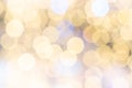 Gold bokeh background. Abstract glitter festive blur lights. Soft yellow christmas backdrop. Royalty Free Stock Photo