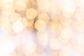 Gold bokeh background. Abstract glitter festive blur lights. Soft yellow christmas backdrop. Royalty Free Stock Photo