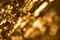 Gold bokeh background with ultra soft round elements and sunny light expression.