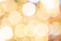 Gold bokeh lights. Abstract glitter festive blur background. Christmas and New Year holidays backdrop Royalty Free Stock Photo