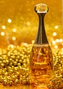 gold bottle parfume close-up dior bokeh background glitter glass reflection shine garland