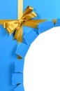 Gold bow and blue christmas gift torn open, white copy space, vertical