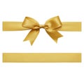 Gold bow made of satin ribbon Royalty Free Stock Photo