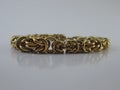 Gold Bracelet. Elegant Jewelry Golden Bracelet Made of Gold Wire.