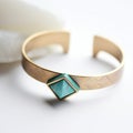 Geometric Surrealism Gold Bracelet With Turquoise Stones And Square Stone