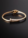 Gold bracelet isolated on black background Royalty Free Stock Photo