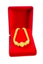 Gold Bracelet in red velvet box isolated on white background, Save clipping path Royalty Free Stock Photo