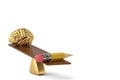 Gold brain and big pencil on the wood seesaw 3D illustration