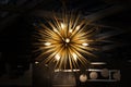 Gold brass copper chandelier, round consisting of gold spikes, rays. Modern beautiful rich design of pendant lamp