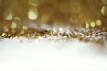 Gold bronze glitter shine dots confetti. Abstract light blink sparkle defocus backgound