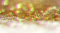 Gold bronze glitter shine dots confetti. Abstract light blink sparkle defocus backgound Royalty Free Stock Photo