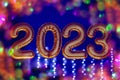 Gold, bronze inflatable foil balloons numbers 2023 on the window against the background the night city, in neon light Royalty Free Stock Photo