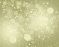 Gold brown abstract background. white light and snowflakes bokeh winter for Christmas new year blurred beautiful shiny lights Royalty Free Stock Photo