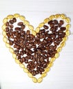 Gold and brown coffee beans heart
