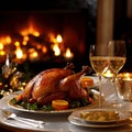 Gold-brown roasted turkey garnished with herbs and oranges. Wine glasses, glowing fireplace