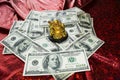 Gold Buddha on dollars Royalty Free Stock Photo