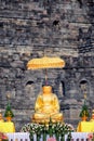 Gold Buddha statue in Borobudur temple