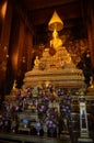 Gold Buddha statue at the Grand Palace of Bangkok Royalty Free Stock Photo