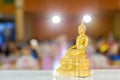 Gold Buddha statue on the table. symbol of Buddhism religion in Thai wedding ceremony.