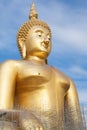 Gold buddha statue under construction in Thai temple with clear sky.WAT MUANG, Ang Thong, THAILAND. Royalty Free Stock Photo