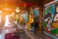 Gold Buddha statues inside chinese temple