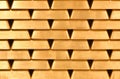 Gold bullion wall texture. Gold bullion background, pattern