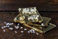 Gold bullions with diamonds Royalty Free Stock Photo