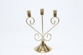 Gold candlestick on white background