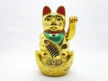 Gold Cat Statue representing luck symbol and sign for traditional chinese culture presented in white isolated background 02 Royalty Free Stock Photo