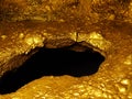 gold cave in the mountain Royalty Free Stock Photo