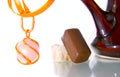 Gold chain and chocolate candy Royalty Free Stock Photo