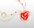 Gold chain with a ruby heart Royalty Free Stock Photo