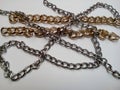 Gold chains and silver chains isolated on a white background Royalty Free Stock Photo